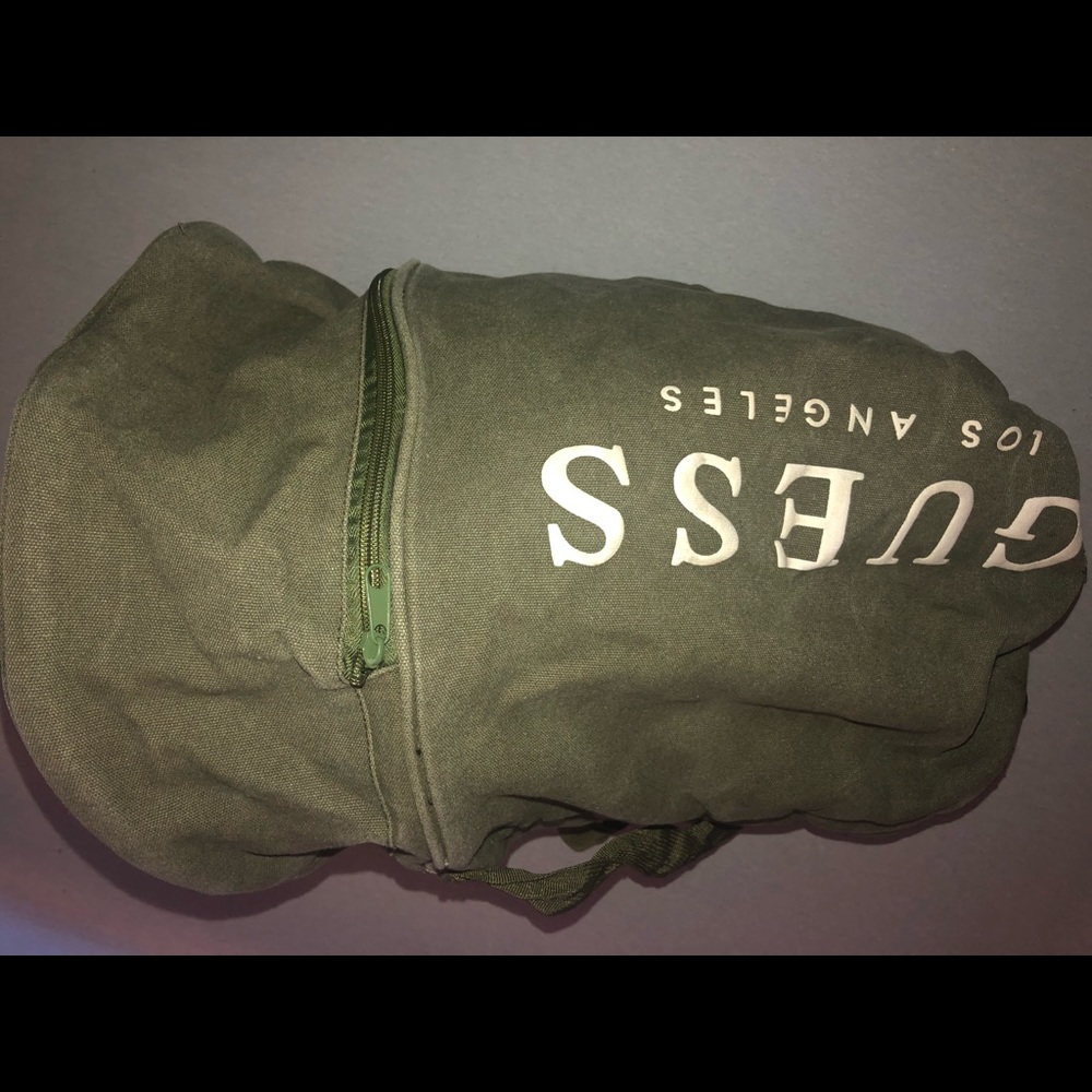 Guess duffer shoulder back bag with draw strings